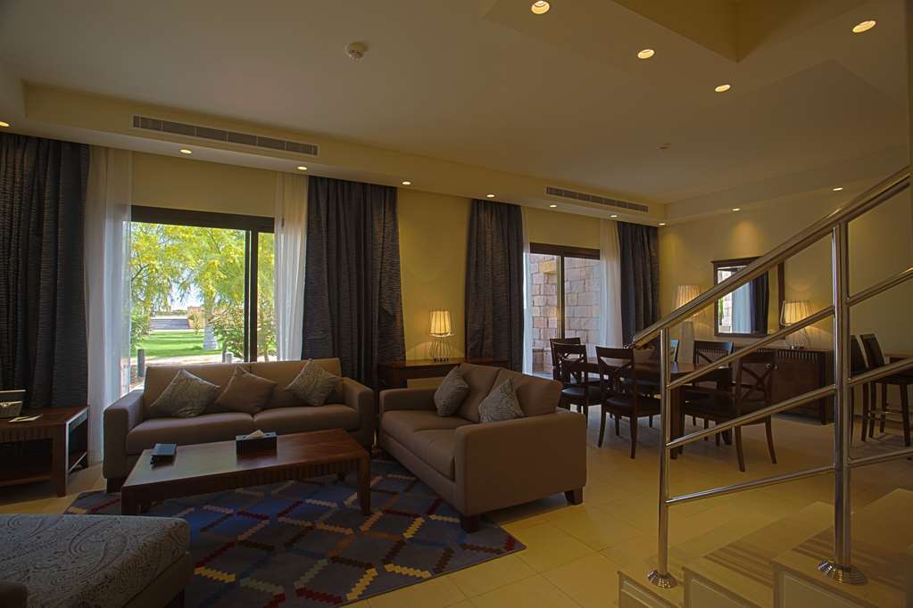 Golden Tulip Sharma Resort Habitación foto